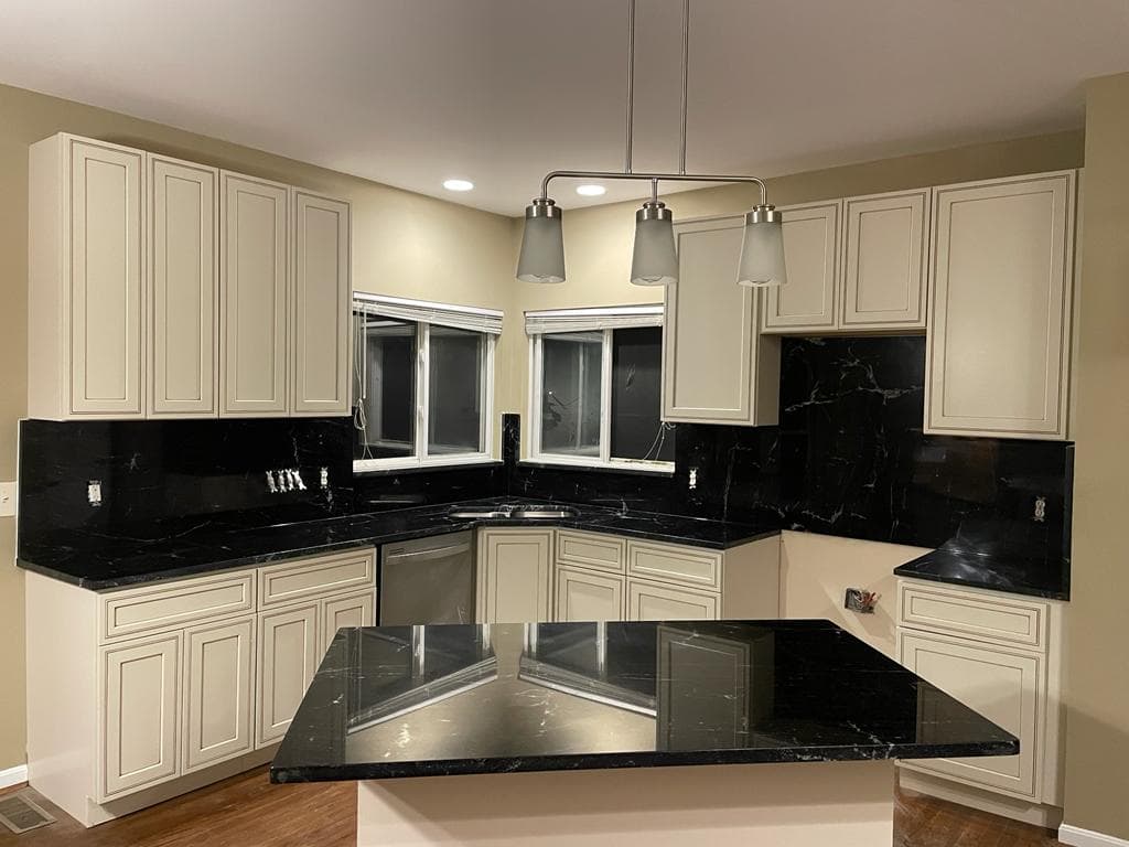 Black Marble with White Cabinets