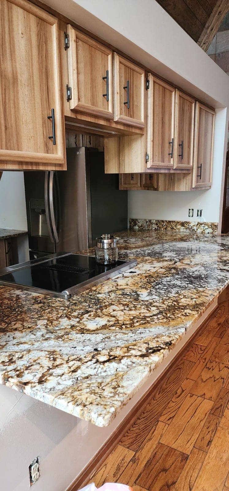 Exotic Granite with Hickory Cabinets