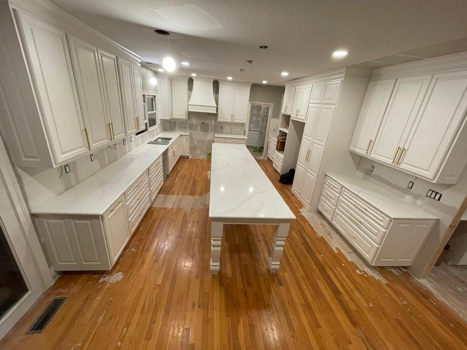 Grand White Kitchen with Long Island